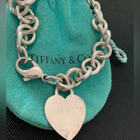 Tiffany & Co. Jewelry - Tiffany silver heart bracelet and pouch.